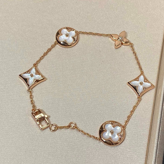 [Noble Jewelry]STAR AND SUN 5 MOTIF MOP PINK GOLD BRACELET