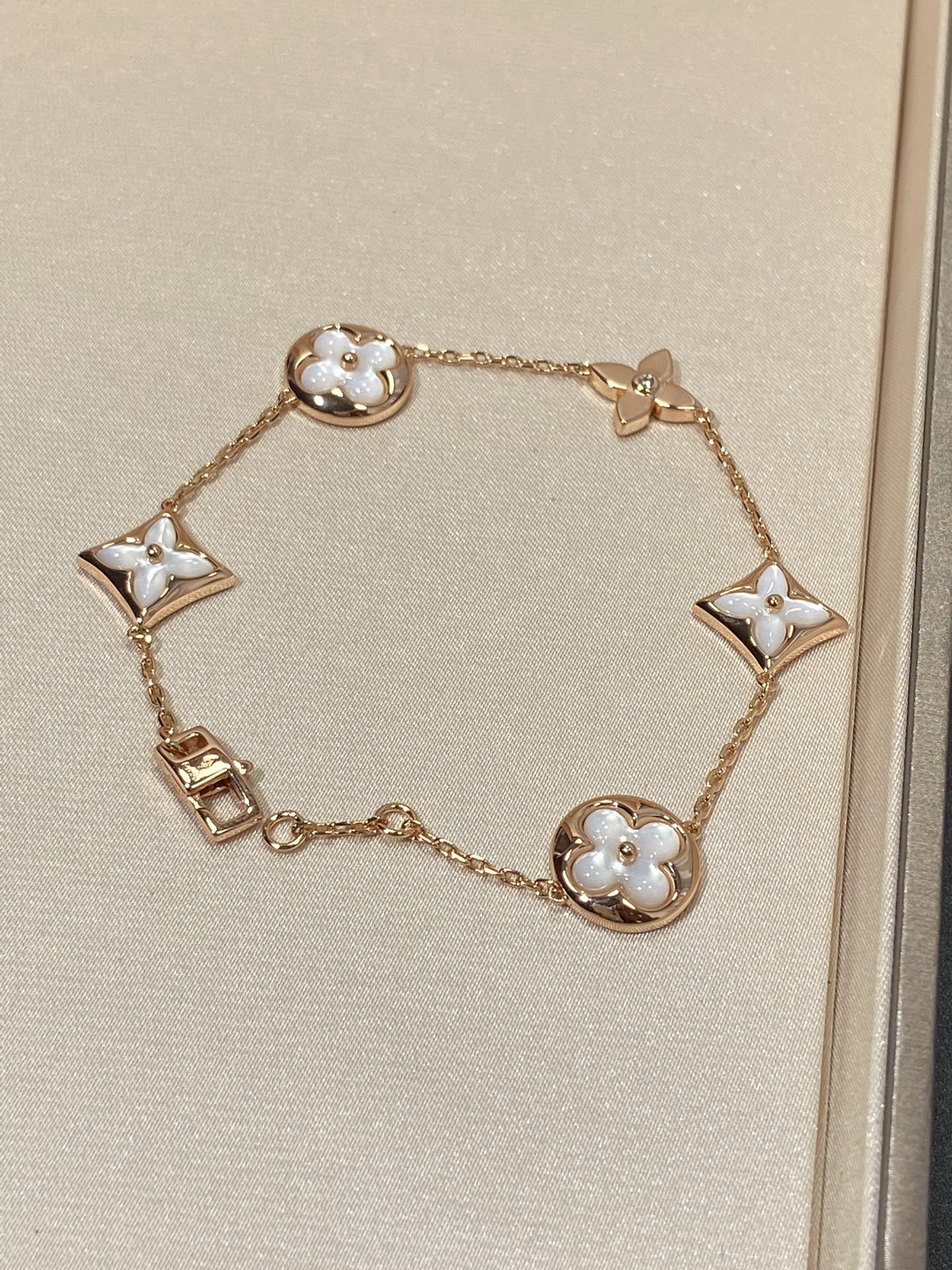 [Noble Jewelry]STAR AND SUN 5 MOTIF MOP PINK GOLD BRACELET