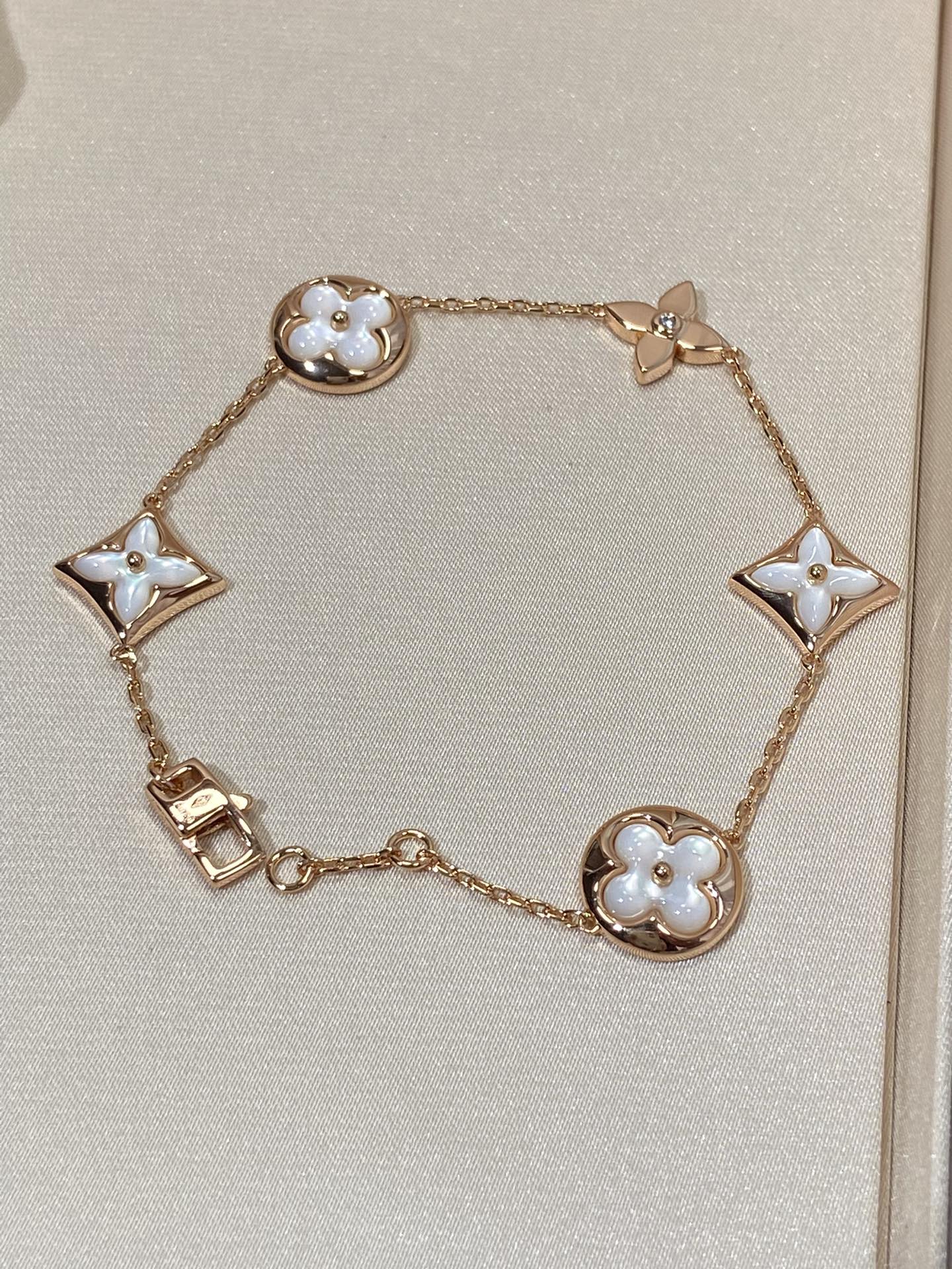 [Noble Jewelry]STAR AND SUN 5 MOTIF MOP PINK GOLD BRACELET