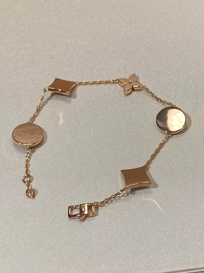 [Noble Jewelry]STAR AND SUN 5 MOTIF MOP PINK GOLD BRACELET